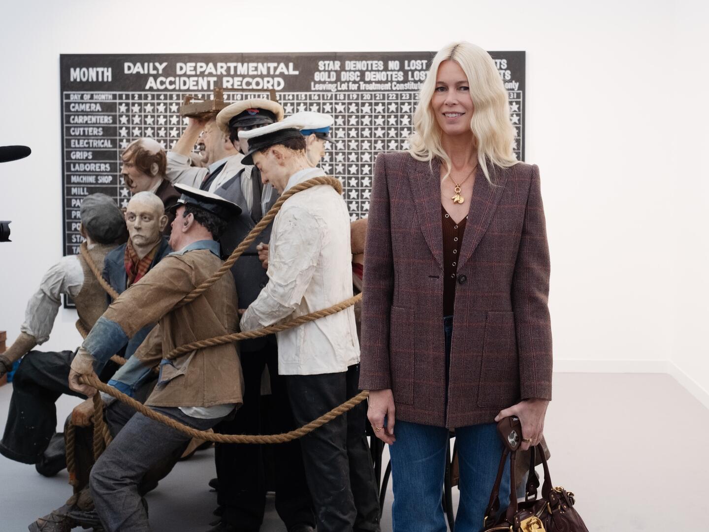 Claudia Schiffer with Alex Margo Arden’s work at Ginny on Frederick at Frieze London. Courtesy: Frieze. Photograph: Linda Nylind