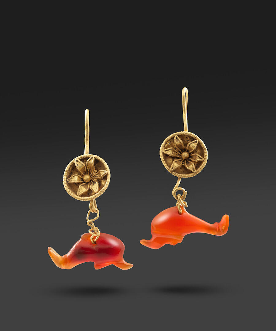Hellenistic Gold Earrings with Carnelian Dolphins, c.300–100 BCE. Gold and carnelian, 2 × 3 cm. Courtesy: Rupert Wace
