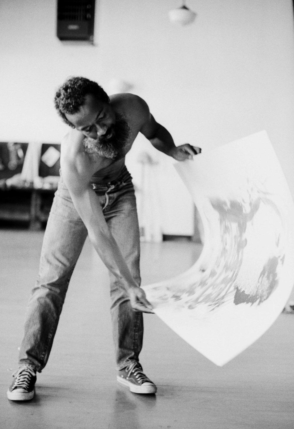 David Hammons making a body print, Slauson Avenue studio, Los Angeles, 1974, digital silver gelatin print, 41 × 51 cm. Courtesy: the artist and The Drawing Centre, New York