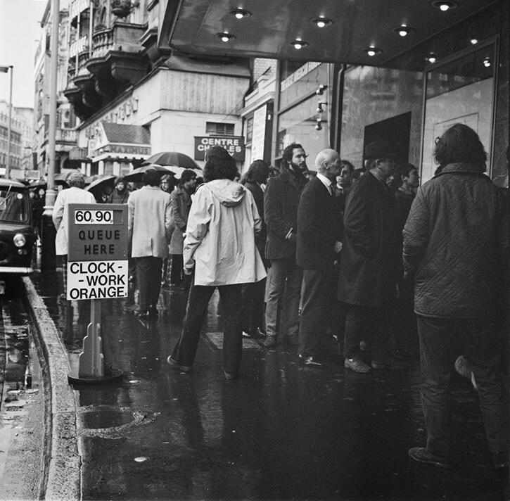 Audiences queue outside the Warner West End cinema in Leicester Square, London, for a screening of the controversial Stanley Kubrick film 'A Clockwork Orange', UK, January 1972. (Photo by Evening Standard/Hulton Archive/Getty Images)