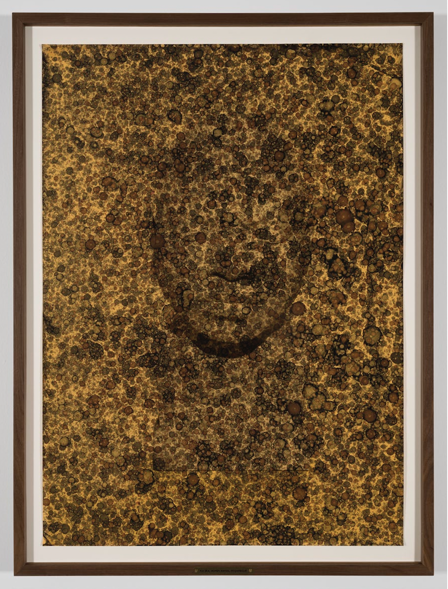 Rosângela Rennó Seres notáveis do mundo (Makera, homen Macua, Moçambique) 2014-2022  Pigmented ink print on handmade marble paper wooden frame and metal plate  Print: 69,5 x 50 cm  Unique piece 